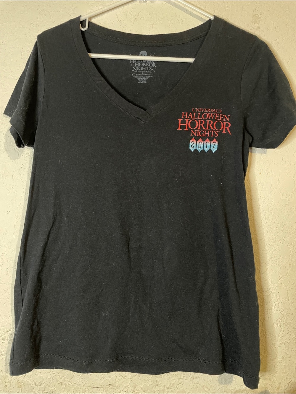 Universal Black V-Neck Tee with Red & Light Blue Logo